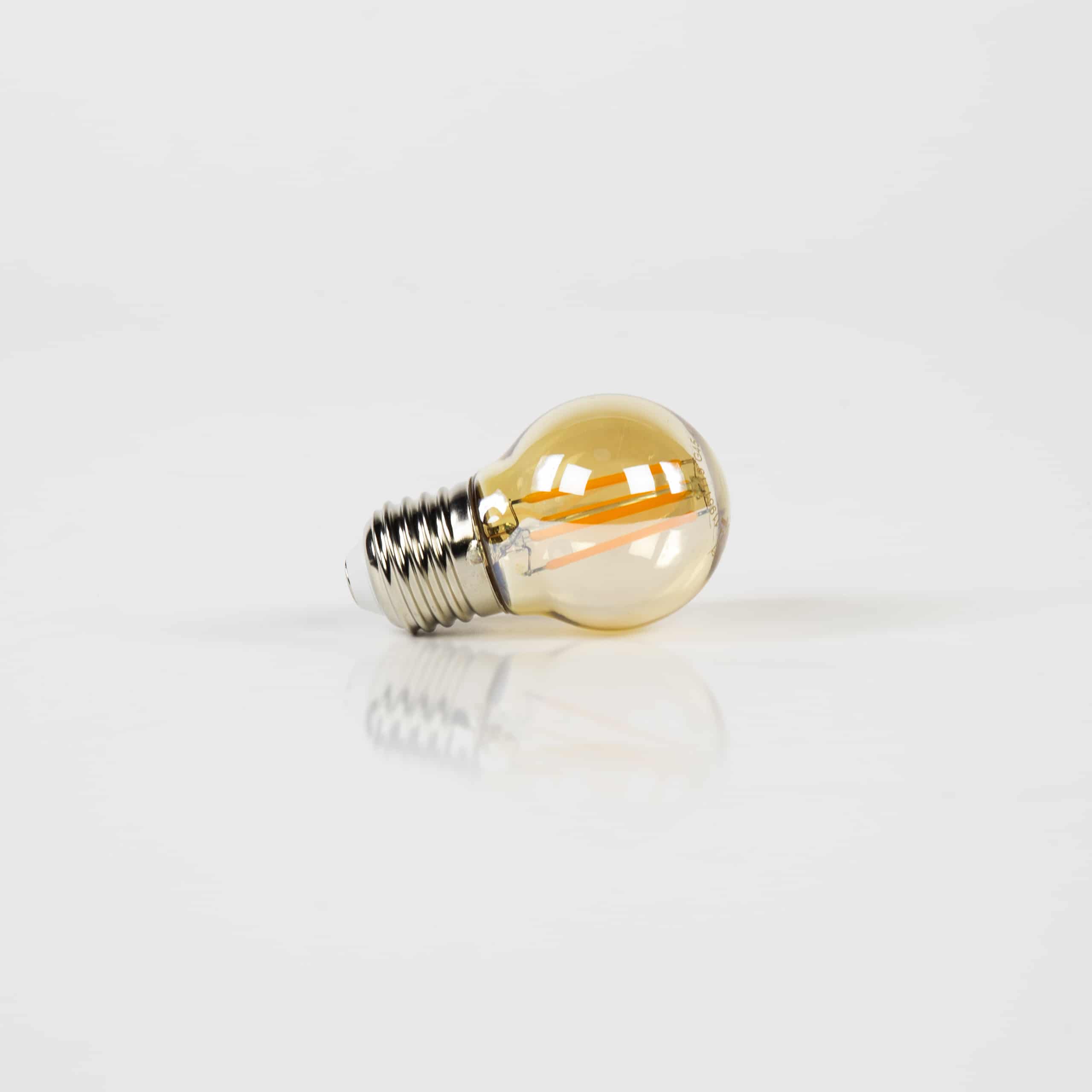 Lichtbron LED [G45] filament bol Ø4,5cm / Amber glas